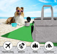 Load image into Gallery viewer, Pet travel bag on beach with a dog in sunglasses, ideal for camping, parks, and travel adventures.
