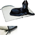 Load image into Gallery viewer, Black dog relaxing on a Comfort Waterproof Dog Sleeping Bag, showcasing its soft, cozy design for outdoor adventures.
