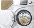 Load image into Gallery viewer, Pet-friendly soft fabric cleaning in washing machine with water and bubbles visible through glass door.
