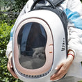 Load image into Gallery viewer, Space Capsule Cat Backpack showcasing a cat in a transparent window, designed for stylish and comfortable travel.
