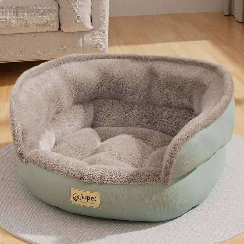 Cozy Comfort Four Seasons Pet Sofa Bed with soft fleece interior and durable exterior, perfect for year-round pet relaxation.