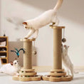 Load image into Gallery viewer, Two playful cats on a stylish cat climbing frame with sisal scratching posts and hanging toys, showcasing fun and active playtime.
