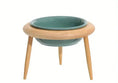 Load image into Gallery viewer, Adjustable ceramic elevated pet bowl designed for cats and dogs, featuring wooden legs for comfortable feeding.
