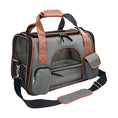 Load image into Gallery viewer, Stylish pet carrier with safety features, multiple pockets, and adjustable shoulder strap for convenient travel.
